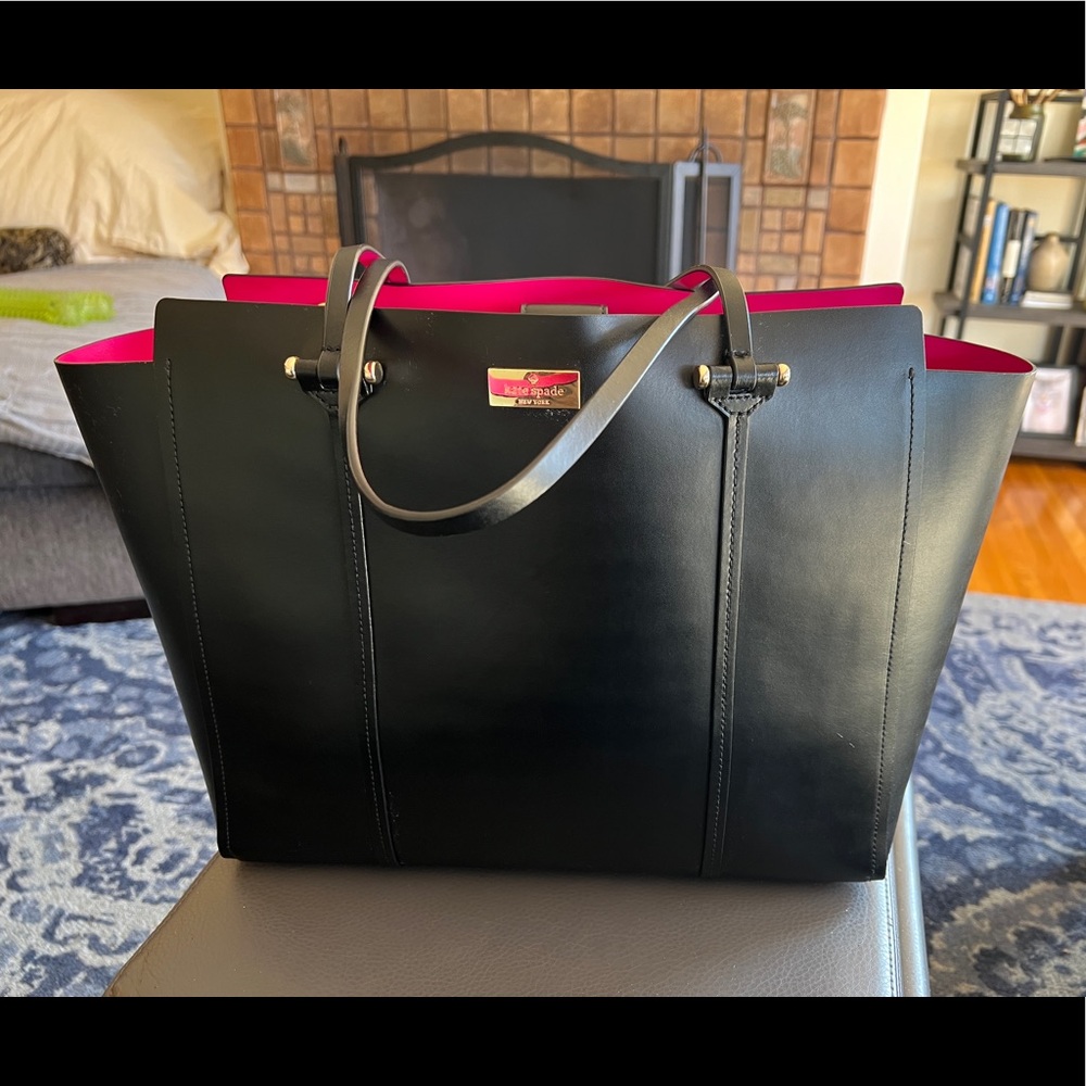 Large Kate Spade Black tote w pink interior.